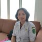 Teks Foto : Kepala UPT P2TP2A Kukar, Faridah (Angga/okeborneo.com)