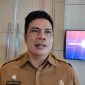 Teks foto: Kepala DP3A Kukar, Bambang Arwanto (Angga/okeborneo.com)