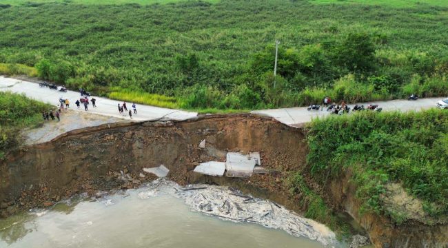 Jalan Oloy yaang terputus di Desa Kayu Batu, Kecamatan Muara Muntai (Istimewa)