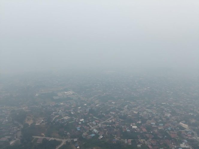 
kabut asap di Kota Tenggarong (istimewa)